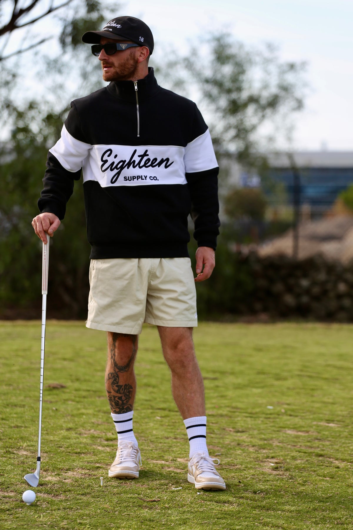 Heritage Quarter Zip in Eighteenth Black, worn on the course