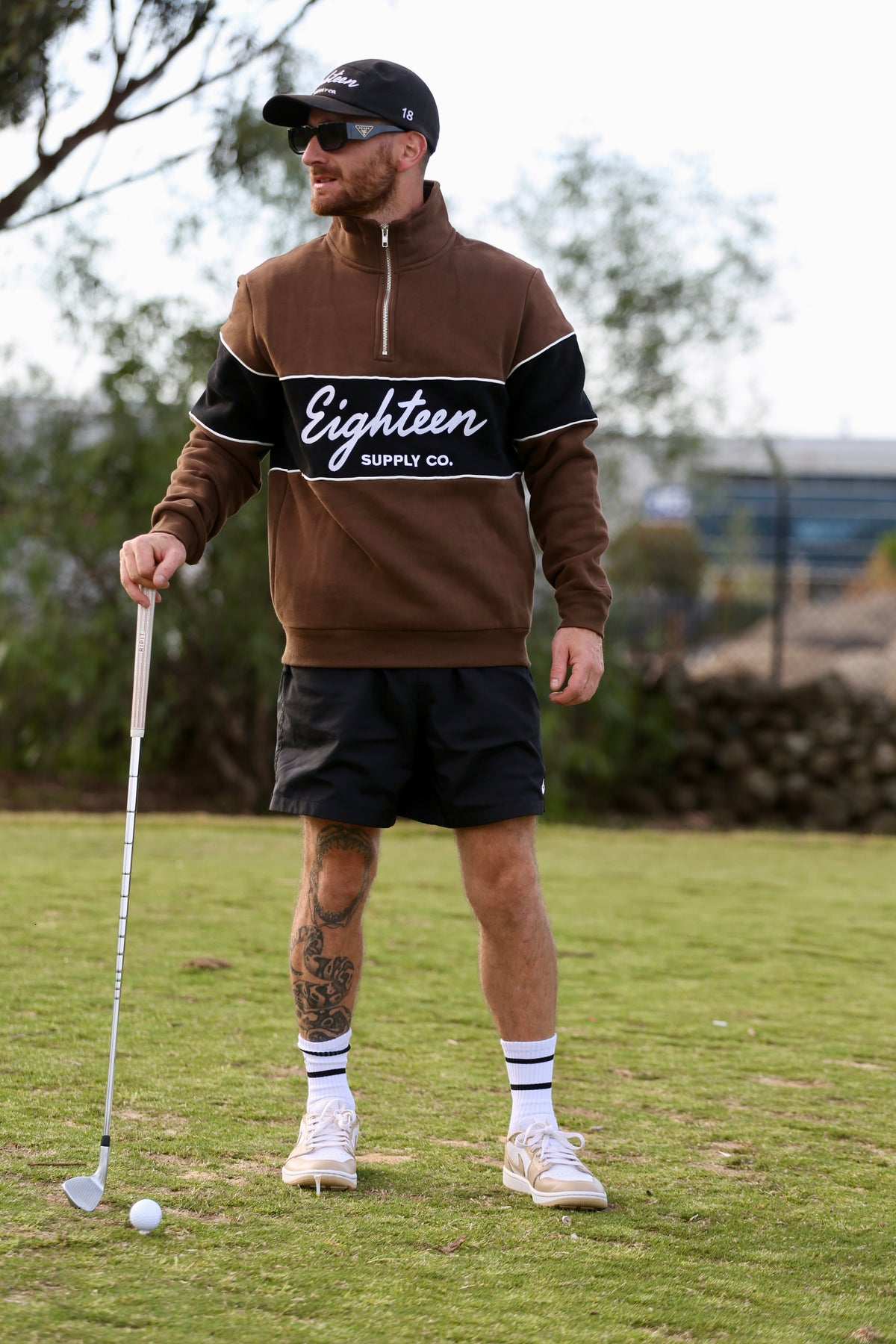 Heritage Quarter Zip in Bunker Brown, worn on the course